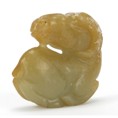 424 - Chinese russet and green jade carving of a lamb, 5cm high