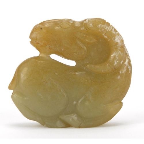 424 - Chinese russet and green jade carving of a lamb, 5cm high