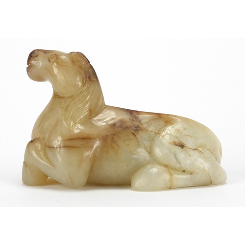 417 - Chinese white and russet jade carving of a recumbent horse, 8cm in length