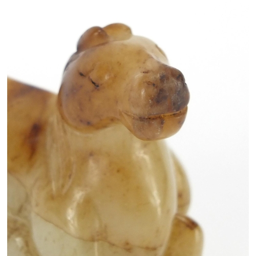 417 - Chinese white and russet jade carving of a recumbent horse, 8cm in length