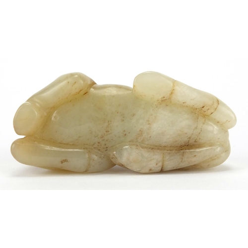 417 - Chinese white and russet jade carving of a recumbent horse, 8cm in length