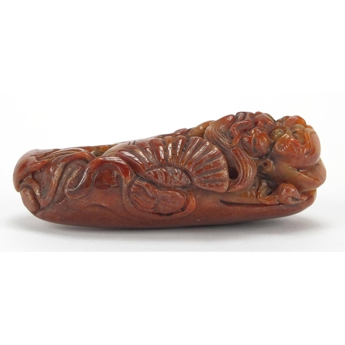 431 - Chinese brown jade carving of a mythical figure, 10cm high