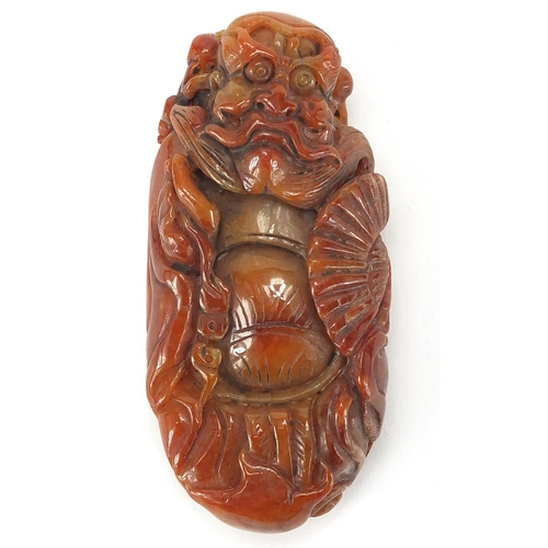 431 - Chinese brown jade carving of a mythical figure, 10cm high