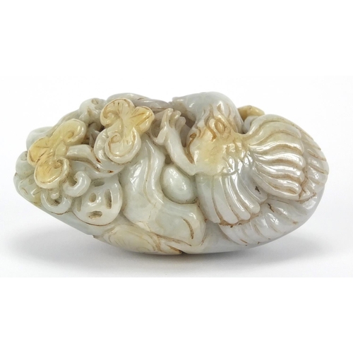 429 - Chinese white jade touch stone carved with a bird of Paradise and a bat, 8.5cm high