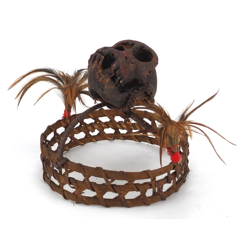 477 - Tribal interest headdress with monkey skull, possibly Burmese, 18cm high x 19cm in diameter