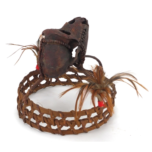 477 - Tribal interest headdress with monkey skull, possibly Burmese, 18cm high x 19cm in diameter