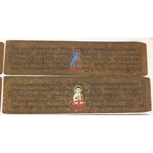 473 - Tibetan carved wood prayer box set with turquoise and coral stones, containing various paper scriptu... 