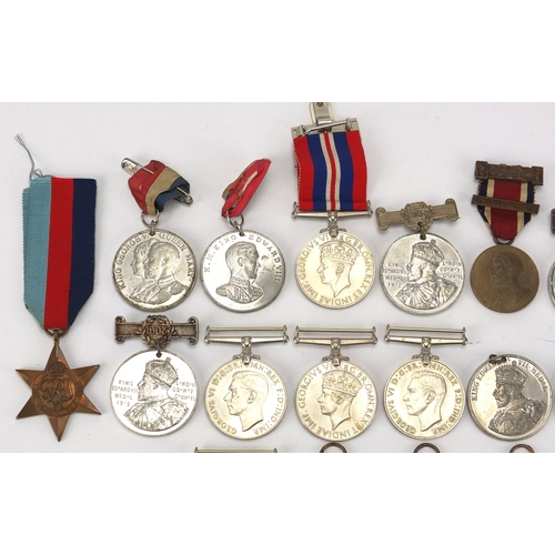 271 - British Military World War II medals and commemorative medallions, together with a silver and enamel... 