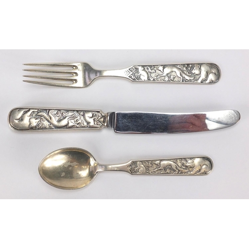 627 - Norwegian 830S silver Christening set by David Andersen, each cast with wild animals, the largest 17... 