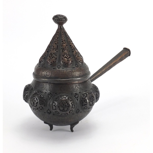 472 - Islamic bronze incense burner with open metal work, embossed with wild animals, 24cm high