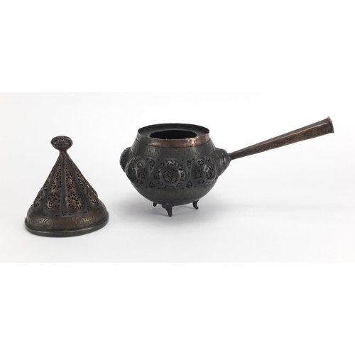 472 - Islamic bronze incense burner with open metal work, embossed with wild animals, 24cm high