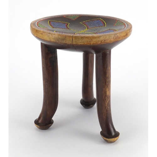 491 - African hardwood stool with inset beadwork, 25cm high