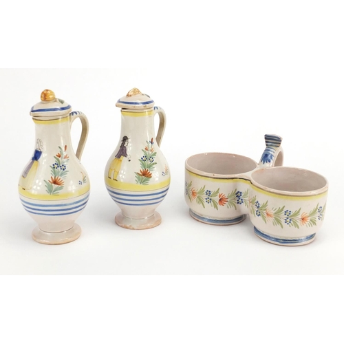 539 - French Quimper pottery oil and vinegar cruet, the bottles hand painted with a traditional lady and g... 