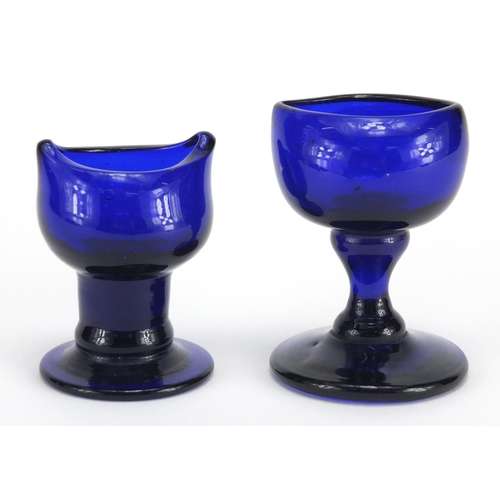 549 - Two Victorian Bristol Blue glass eye baths, the largest 6.2cm high