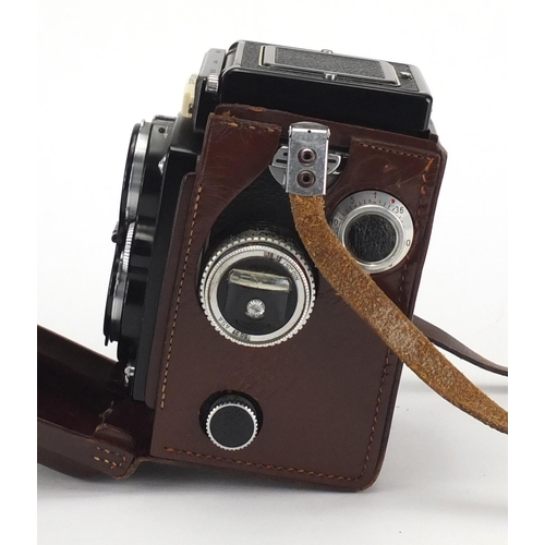 125 - Rolleiflex twin lense camera by Franke and Heidecke, with accessories, serial numbered 1746177