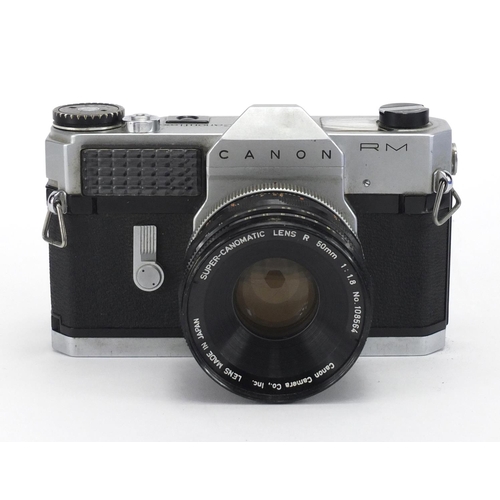 128 - Canonflex RM camera with Super-Canon lense and accessories including a Minox monocular, the camera w... 
