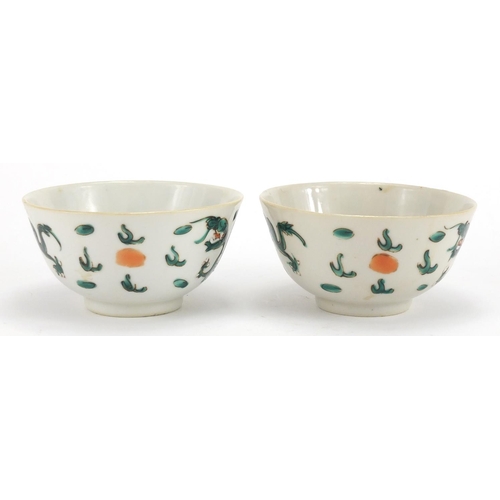 348 - Pair of Chinese porcelain bowls, both hand painted in the famille verte palette with dragons amongst... 