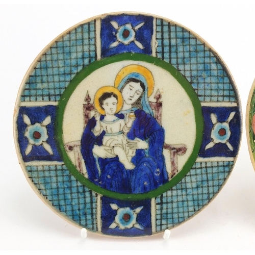 541 - Circular stoneware wall plaque hand painted with Madonna and Child together with a plaster example, ... 