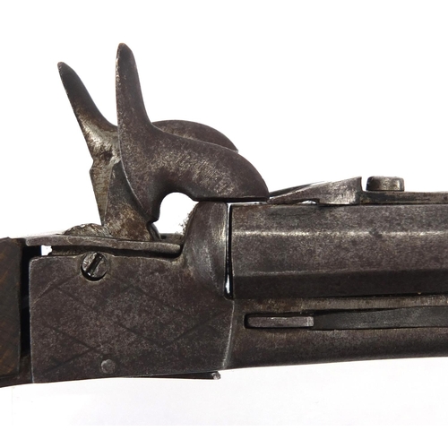 302 - 19th century French double barrel pocket pistol with wooden grip, 22cm in length