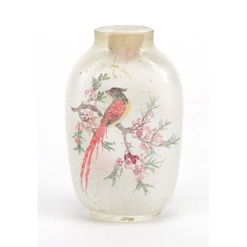 434 - Chinese white jade bangle together with a glass scent bottle, the interior hand painted with birds o... 