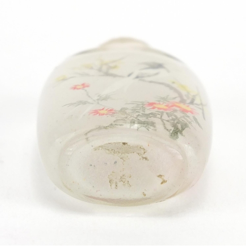 434 - Chinese white jade bangle together with a glass scent bottle, the interior hand painted with birds o... 