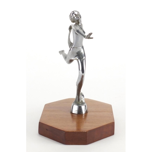 599 - Art Deco silvered bronze car mascot of an Art Deco female, stamped Lorenzl, on wooden base, 18cm hig... 