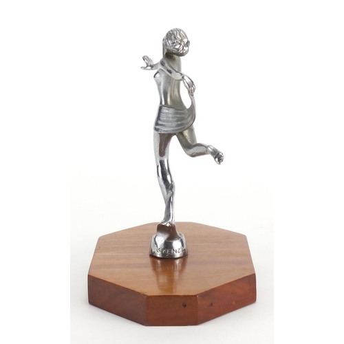 599 - Art Deco silvered bronze car mascot of an Art Deco female, stamped Lorenzl, on wooden base, 18cm hig... 