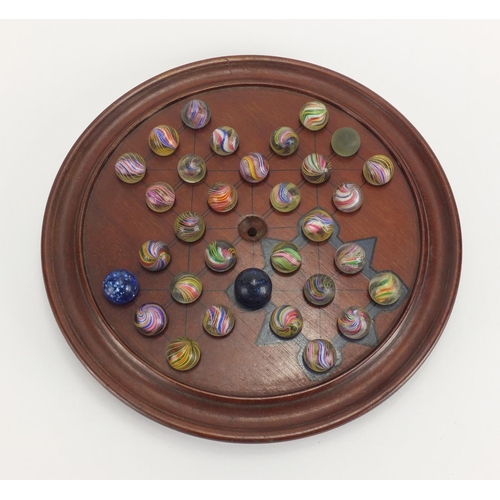 326 - 19th century solitaire board with marbles, the board 25.5cm in diameter