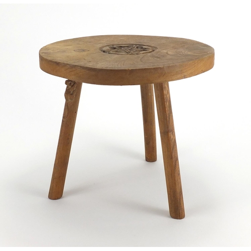 616 - Oak three legged stool, with floral carved top and carved mouse to one of the legs, 23cm high x 27cm... 