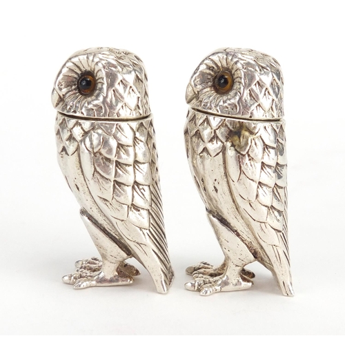 647 - Pair of novelty silver salt and pepper shakers, in the form of owls with glass eyes, P.J.M Birmingha... 