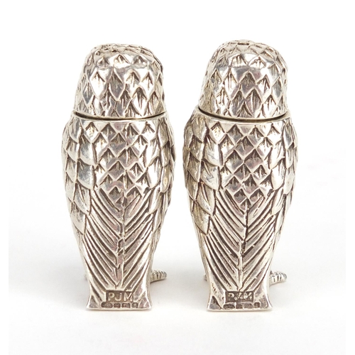 647 - Pair of novelty silver salt and pepper shakers, in the form of owls with glass eyes, P.J.M Birmingha... 