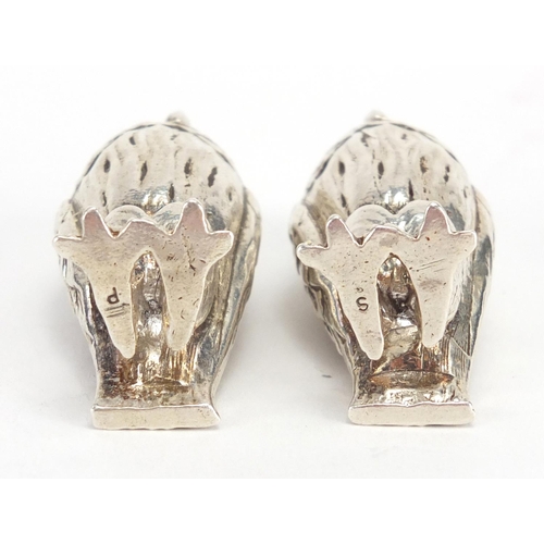 647 - Pair of novelty silver salt and pepper shakers, in the form of owls with glass eyes, P.J.M Birmingha... 