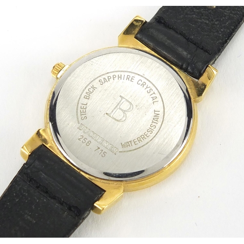 830 - Ladies Bucherer wristwatch with date dial, numbered 256715 to the back, 2.6cm in daimeter