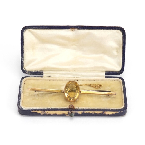 724 - 9ct gold citrine bar brooch, 7cm in length, approximate weight 7.0g