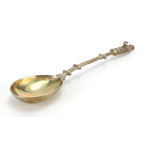 674 - Continental silver coloured metal apostle spoon, indistinct  marks to the bowl, 19.cm in length, app... 