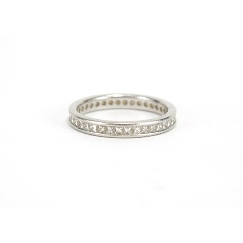 688 - Unmarked platinum and diamond eternity ring, size O, approximate weight 3.8g