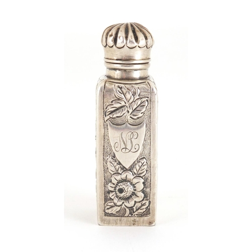 39 - Victorian silver scent bottle embossed with flowers, hinged lid and glass stopper, A.W.P Birmingham ... 