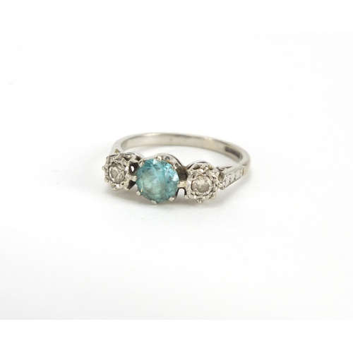 753 - 18ct white gold Aquamarine and diamond ring, size M, approximate weight 3.8g