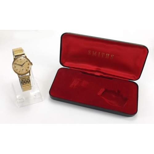 816 - Gentleman's 9ct gold Smiths Deluxe wristwatch with subsidiary dial, 3cm in diameter, with box and re... 