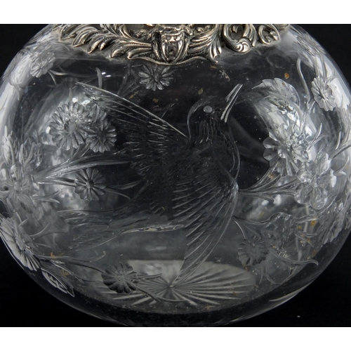 36 - Victorian silver topped Webb rock crystal scent bottle carved with a bird amongst flowers, the silve... 