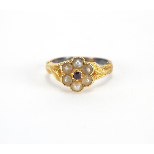 732 - Antique unmarked gold seed pearl and garnet flower head ring, size I, approximate weight 2.2g