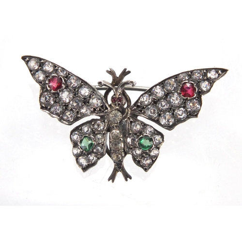 755 - Antique gold and silver butterfly brooch and flower head earrings, set with colourful glass stones, ... 