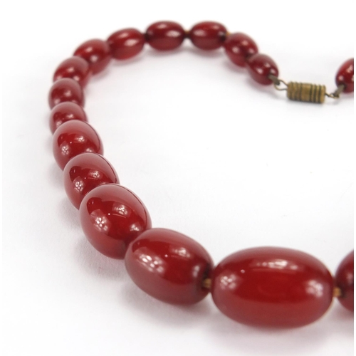 790 - Cherry amber coloured bead necklace, 40cm in length, approximate weight 35.2g