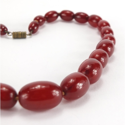 790 - Cherry amber coloured bead necklace, 40cm in length, approximate weight 35.2g