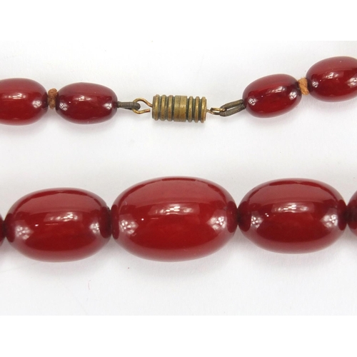 790 - Cherry amber coloured bead necklace, 40cm in length, approximate weight 35.2g