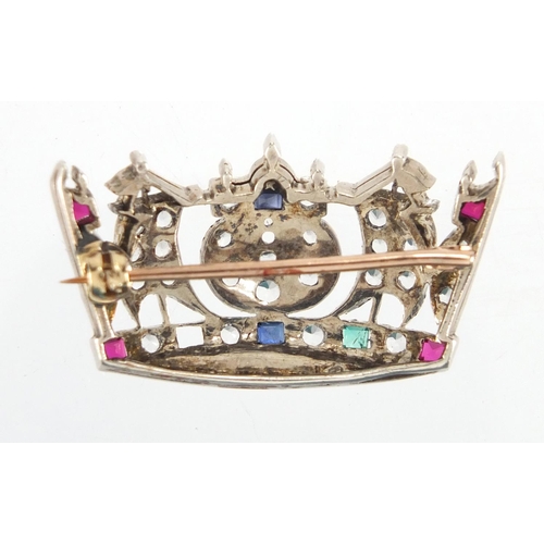 763 - Antique gold and silver crown brooch, set with colourful glass stones, 3.5cm in length, housed in a ... 