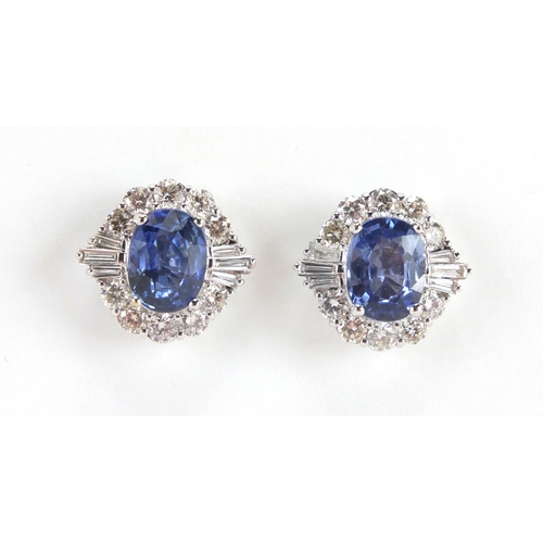 684 - Pair of 18ct white gold Sapphire and Diamond cluster earrings