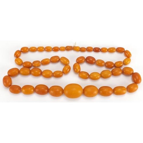 777 - Butterscotch amber bead necklace, 86cm in length, approximate weight 99.8g