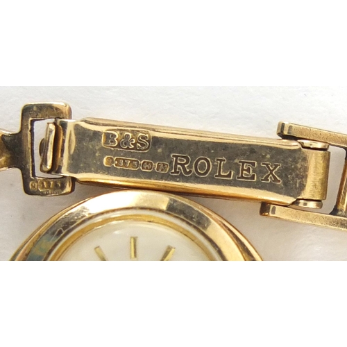 823 - Ladies 9ct gold Rolex Tudor wristwatch with 9ct gold strap, numbered317523 to the case, 1.1cm in dia... 