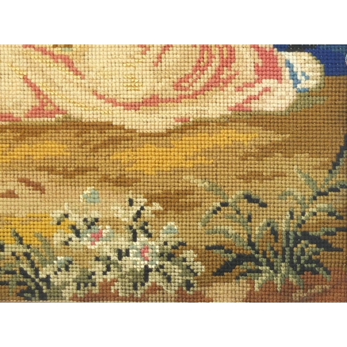 84 - 19th century needlepoint depicting figures surrounding a tree, housed in a carved rosewood frame, ov... 